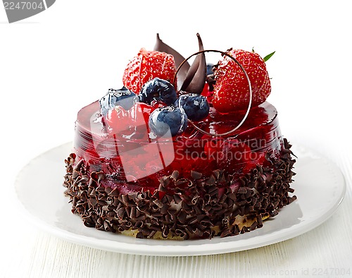 Image of cake with fresh berries and chocolate