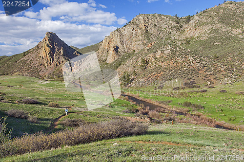 Image of hiker in mountain scenery