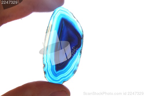 Image of agate gem in human hand