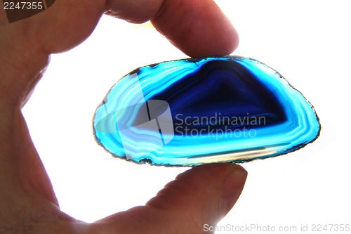 Image of agate gem in human hand