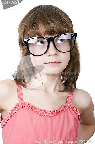 Image of cute thoguhtful child with funny glasses