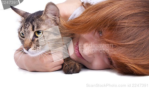 Image of child  with her cat