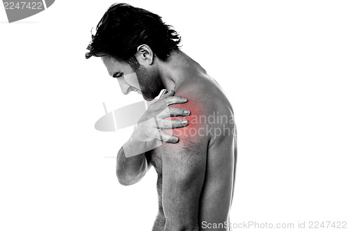 Image of Middle aged man having shoulder ache