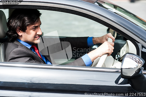 Image of Businessman in his car