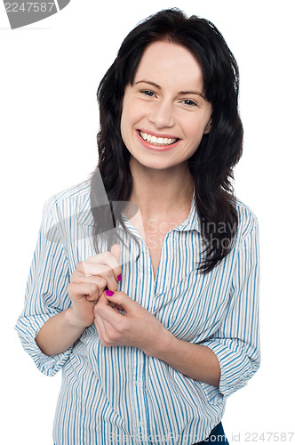 Image of Smiling young girl posing casually