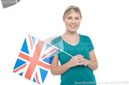 Image of Young UK supporter holding national flag