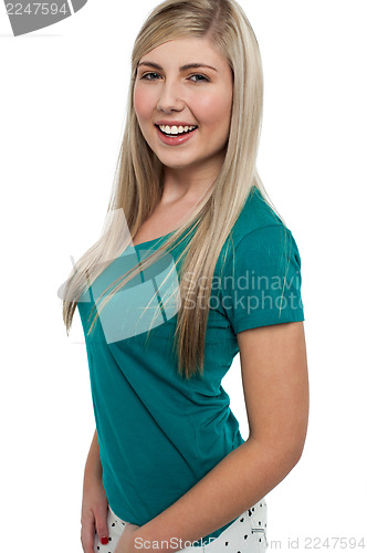 Image of Pretty teen blonde dressed in casuals