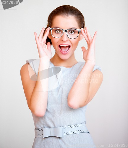 Image of Young attractive business woman with glasses