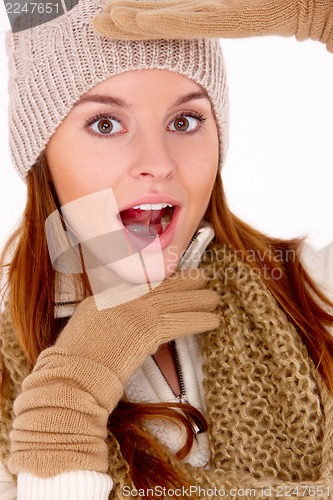 Image of Beautiful woman wearing warm winter clothes