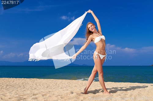 Image of Smiling woman with white scarf