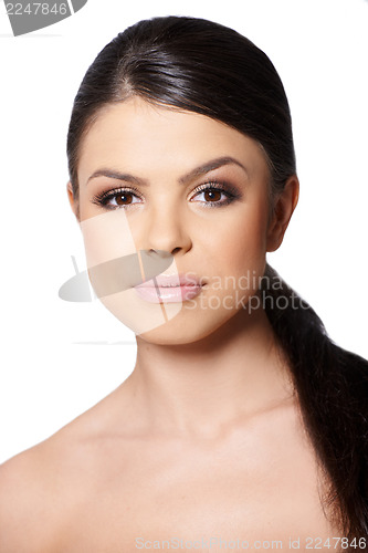 Image of Portrait of brunette girl looking at camera