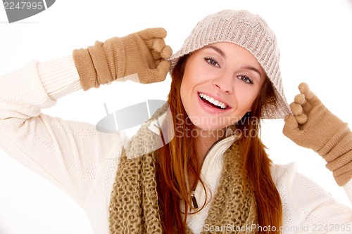 Image of Beautiful woman wearing warm winter clothes