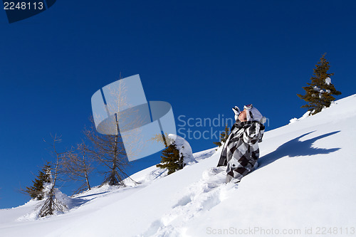 Image of Female Snowboarder in Dolomites