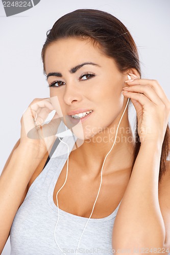 Image of Young woman with headphones