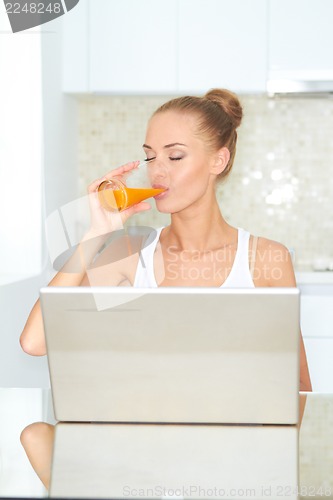 Image of Healthy woman using laptop
