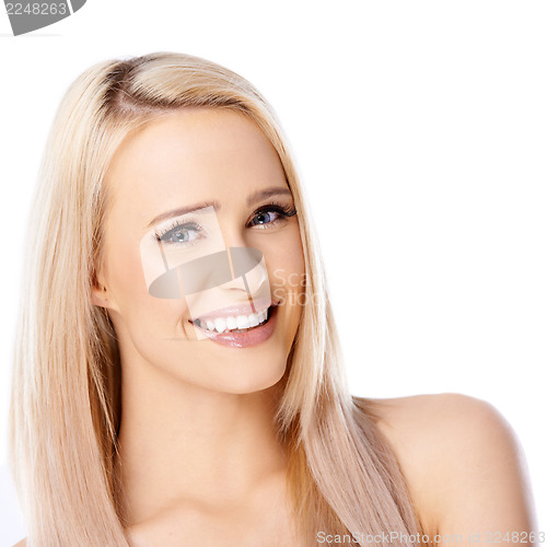 Image of Happy long haired blond woman on white