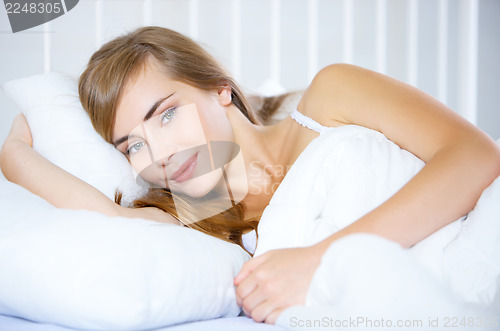 Image of Teenage Girl on Bed