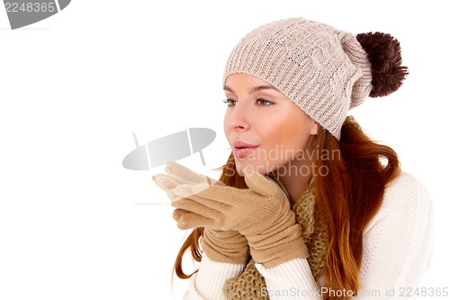 Image of Beautiful woman wearing warm winter clothes