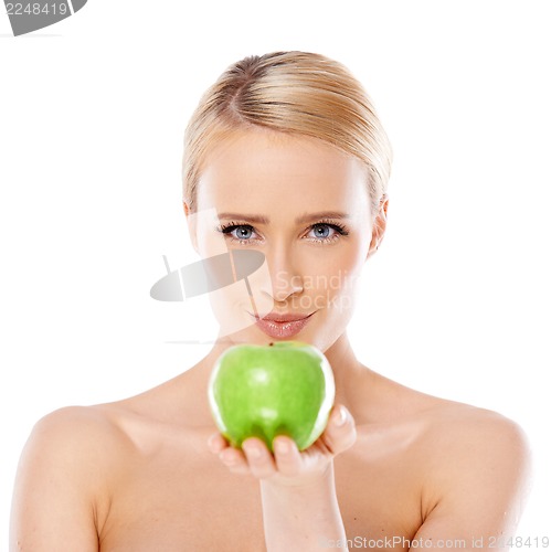 Image of Adorable and healthy woman holding apple