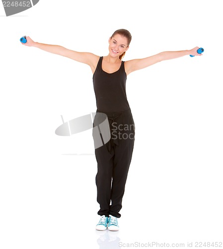 Image of Fitness woman working out with dumbbells