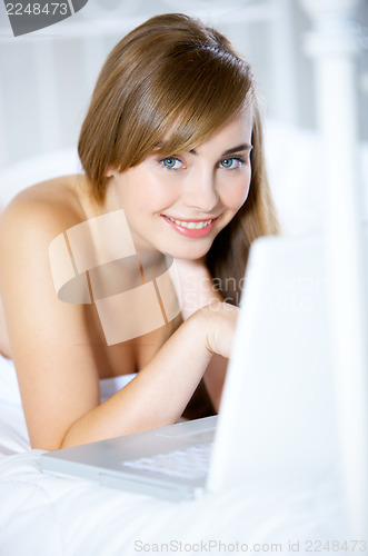 Image of Teenage Girl on Bed