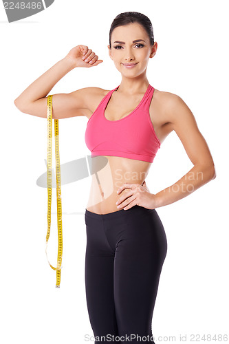 Image of Slim woman with a tape measure