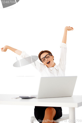 Image of Busineswoman stretching and yawning