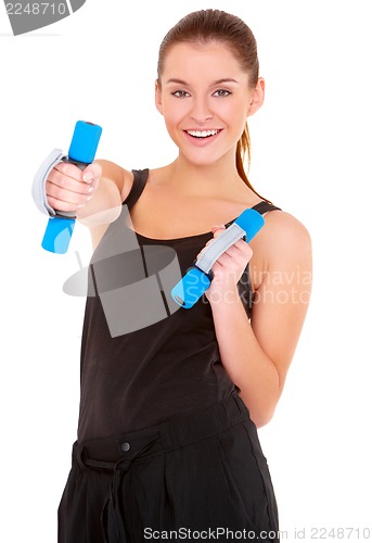 Image of Fitness woman working out with dumbbells