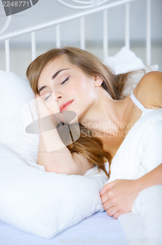 Image of Teenage Girl on Bed