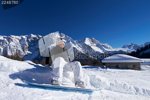 Image of Female Snowboarder in Dolomites