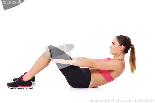 Image of Woman doing sit ups