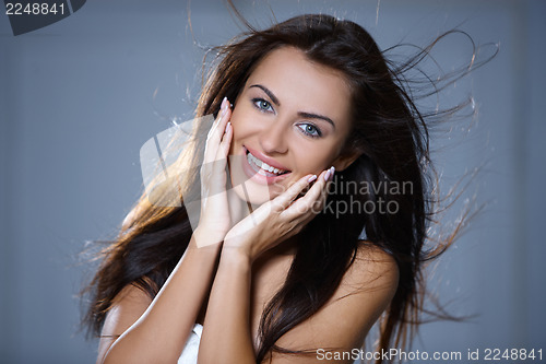 Image of Portrait of beautiful young woman 