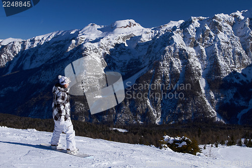 Image of Female Snowboarder in Dolomites