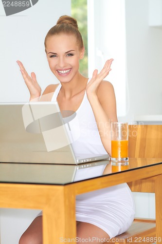 Image of Healthy woman using laptop