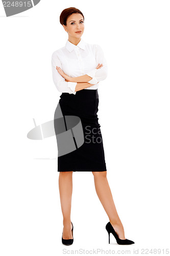 Image of Beautiful businesswoman with folded arms