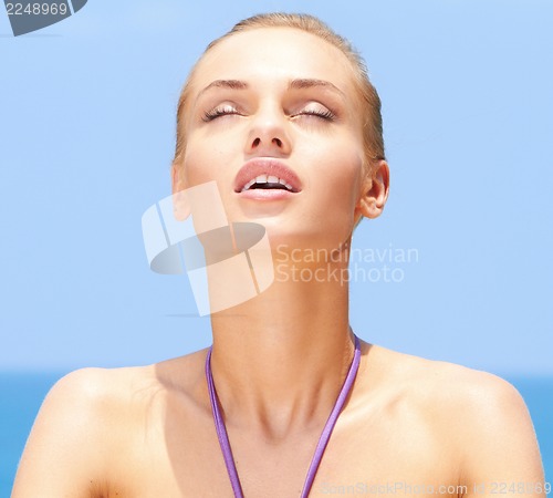 Image of Taking sunbath at the beach