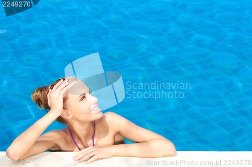 Image of Cute in swimming pool with copy space