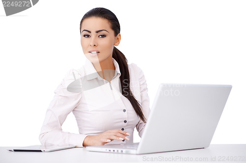 Image of Proffesional worker sitting in front of compurer