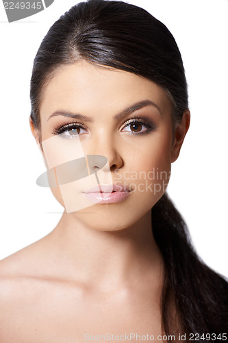 Image of Portrait of beautiful girl looking at camera on white