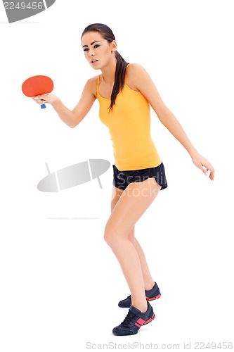 Image of Female tabne tennis player ready to serve
