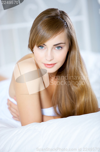 Image of Teenage Girl on Bed