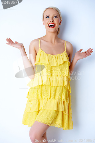 Image of Hilarious blond woman posing over white