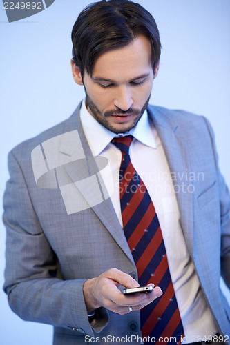 Image of Businessman making a mobile phone call