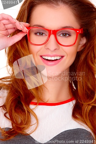 Image of Portrait of young woman wearing glasses on white