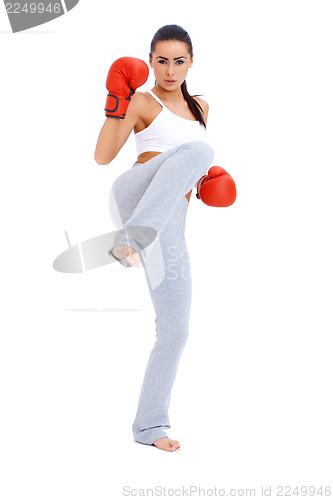 Image of Full body shot of female kick boxer