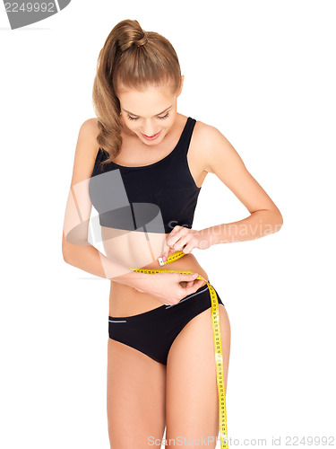 Image of Fitness woman in black sports clothes