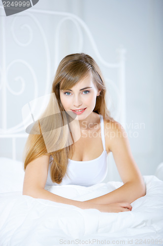 Image of Teenage Girl on Bed