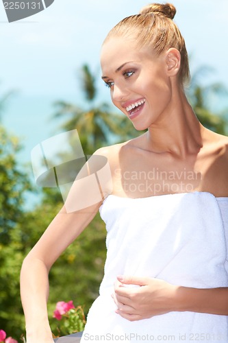 Image of Beautiful blonde wrapped in towel
