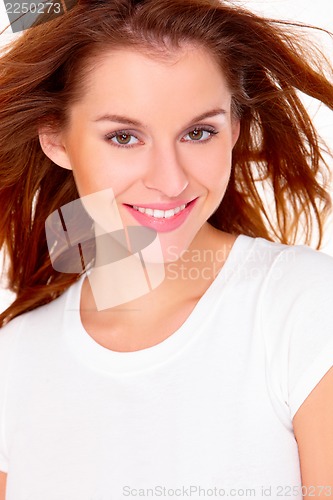 Image of Portrait of cute young woman over white