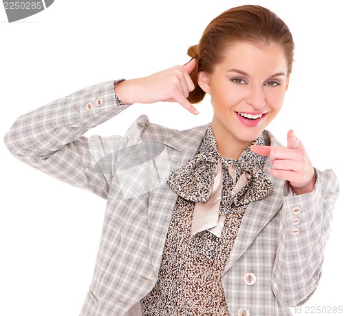 Image of Businesswoman making call me gesture